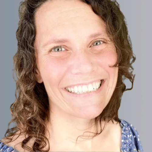 Portrait Image of Melissa Blau with gray background